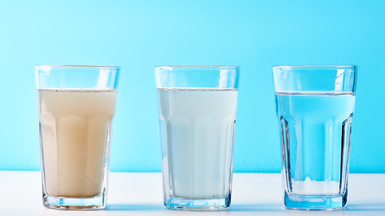 Water Filtration for Connecticut Home Owners Three glasses showing untreated, partially filtered, and clear water, illustrating whole home water filtration results.